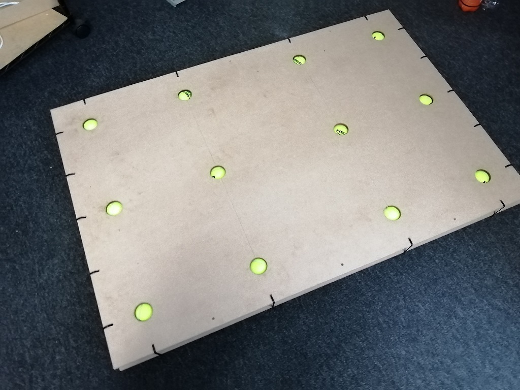 tennis ball riser